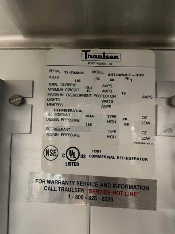 Traulsen Spec Line Series commercial refrigerator label, Model AHT232WUTHHS, SN: T14702A06, 115V, 1 phase, NSF listed.
