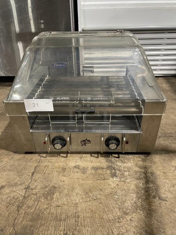 Star Model 258 stainless steel hot dog roller with clear cover, electric-powered, on legs, good condition, 120V.