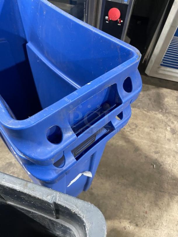 Assorted stackable blue recycle bins and gray trash can, commercial use, durable plastic, used condition.