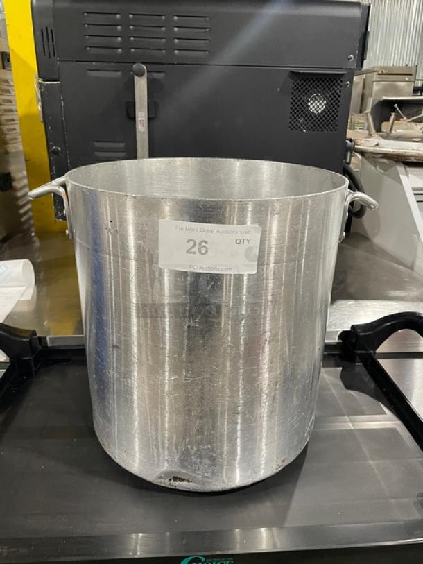 Heavy duty commercial stock pot with handles; silver metal; large capacity; visible wear; auction tag reads "26 QTY".