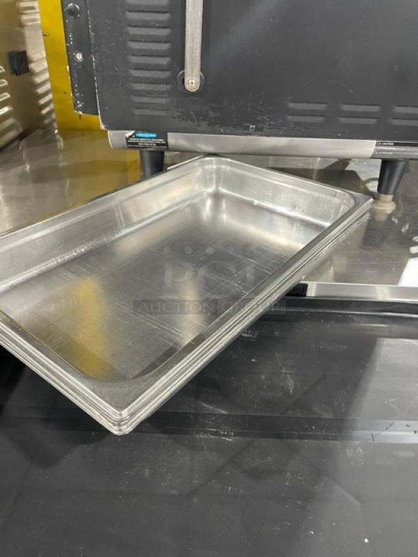 Commercial stainless steel steamtable pan in excellent condition, used for hotel or catering. Durable with visible polish marks.