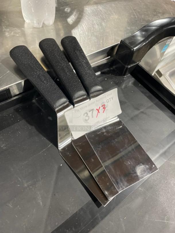 Dexter Russell Sani-Safe Series 4"x3" stainless steel hamburger turners, black grip, model S286-4, new condition.