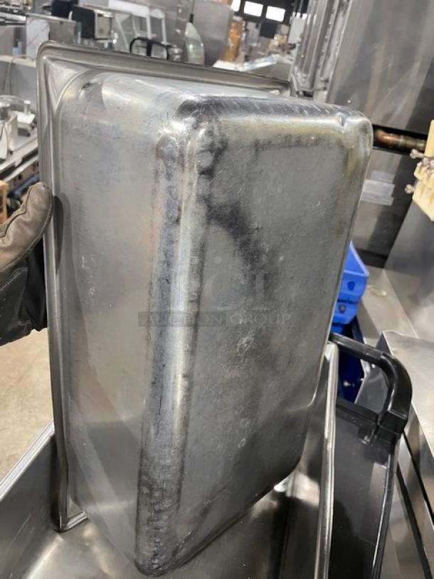 Vollrath Super Pan V Series Model 30062 stainless steel hotel pan. Commercial-grade with visible wear, suitable for steam tables.