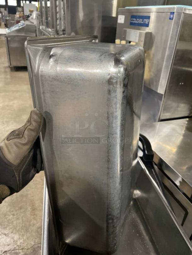 Vollrath Super Pan V Series stainless steel hotel/steamtable pan, model 30062, shows signs of use. Appears durable.