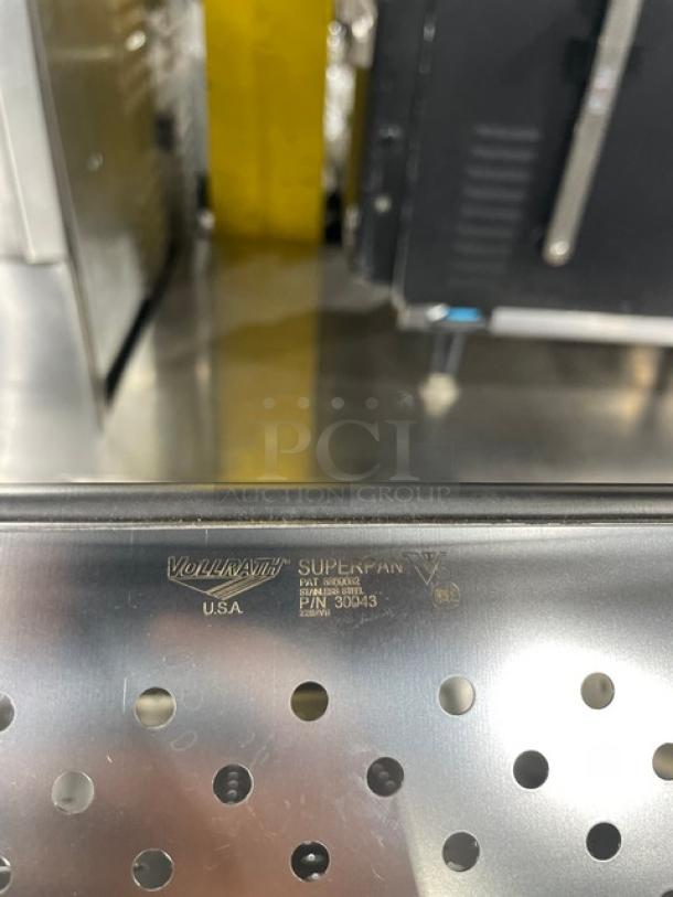 Vollrath Super Pan V Series stainless steel perforated steamtable pan, model 30043, with product markings visible.