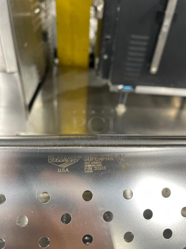 Vollrath Super Pan V Series stainless steel perforated hotel pan, model 30043, shown in excellent condition.