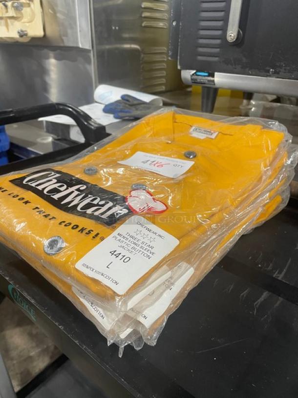 Brand new Chef Wear long sleeve button-down chef jacket, size large, model 4410, in yellow, sealed in packaging.