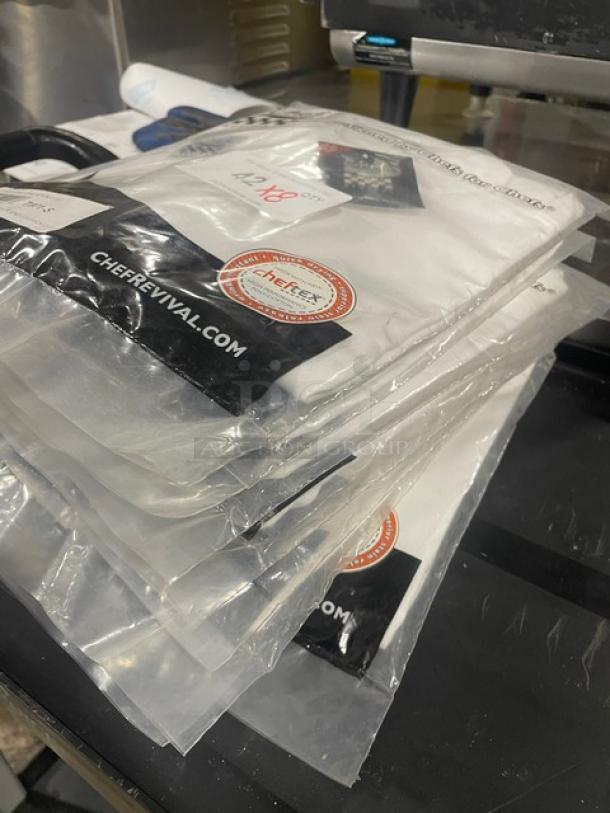 Brand new Chef Revival Executive Chef Tunic Jacket T001-S in original packaging, sealed, showing website and logo.