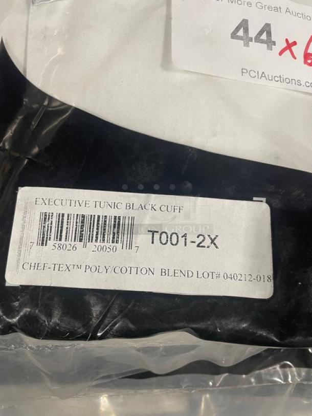 Brand New Chef Revival Chef's Tunic, Size 2X. Executive black cuff, poly/cotton blend. Model T001-2X, lot# 040212-018.