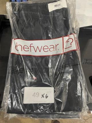Brand new Chef Wear XS chef pants in packaging, labeled for auction quantity 6X, item appears in excellent condition.