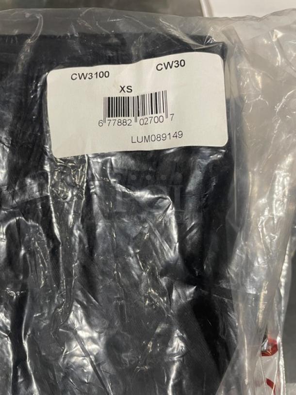 Brand new Chef Wear XS chef pants in packaging, labeled CW3100 CW30, with barcode and code LUM089149.