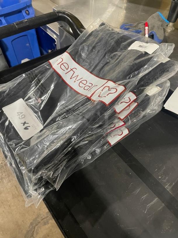Brand new Chef Wear XS chef pants in packaging, set of 6. Black color, labeled size XS, ideal for professional kitchen wear.
