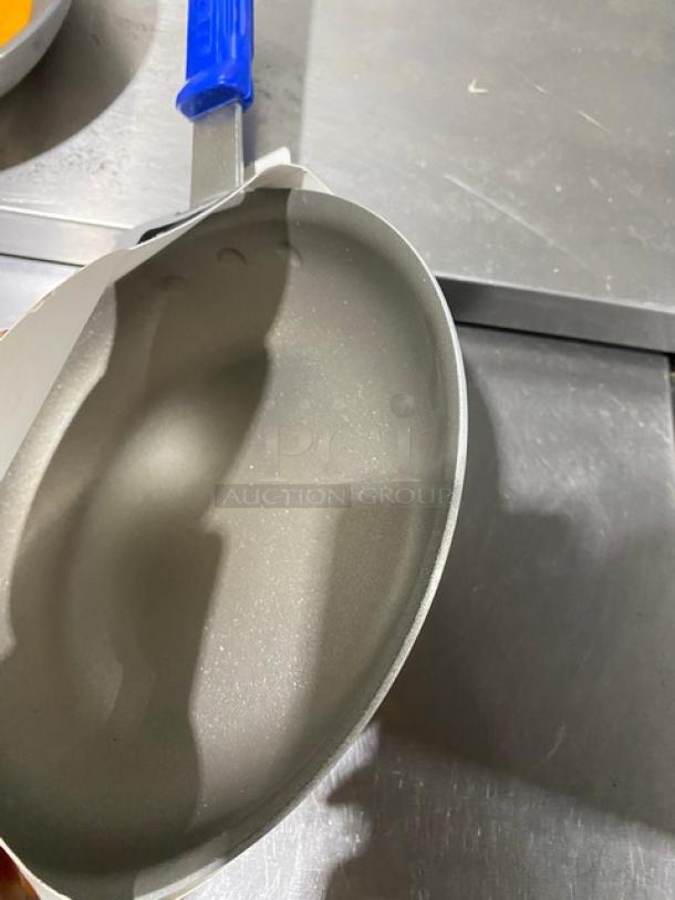 Brand new Vollrath Wear-Ever 8" aluminum fry pan, Powered Coat 2, blue grip handle.