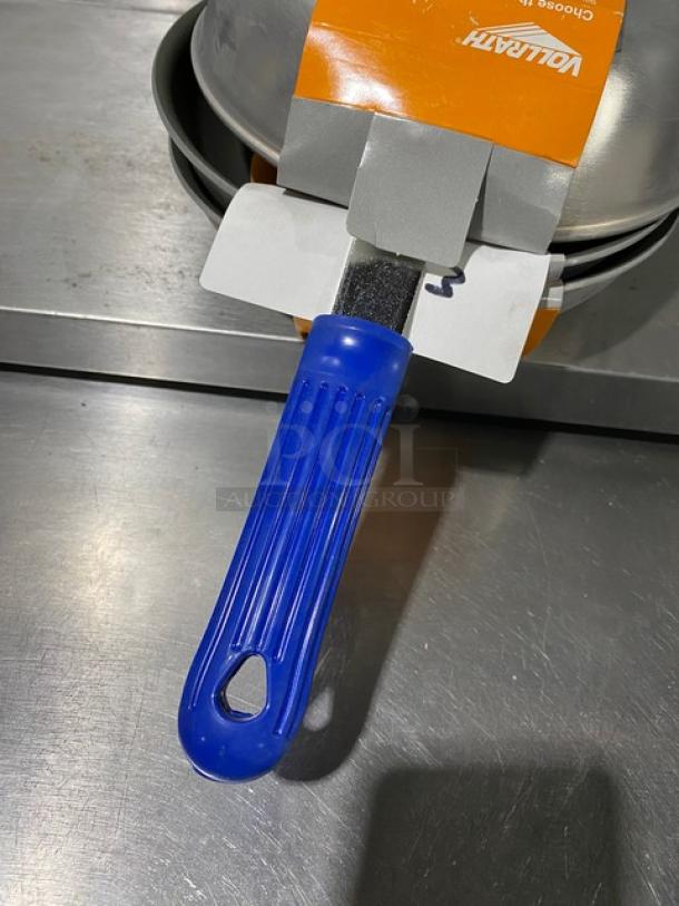 Brand new Vollrath Wear-Ever 8" aluminum fry pan, Powered Coat 2 finish, blue grip handle, with packaging.