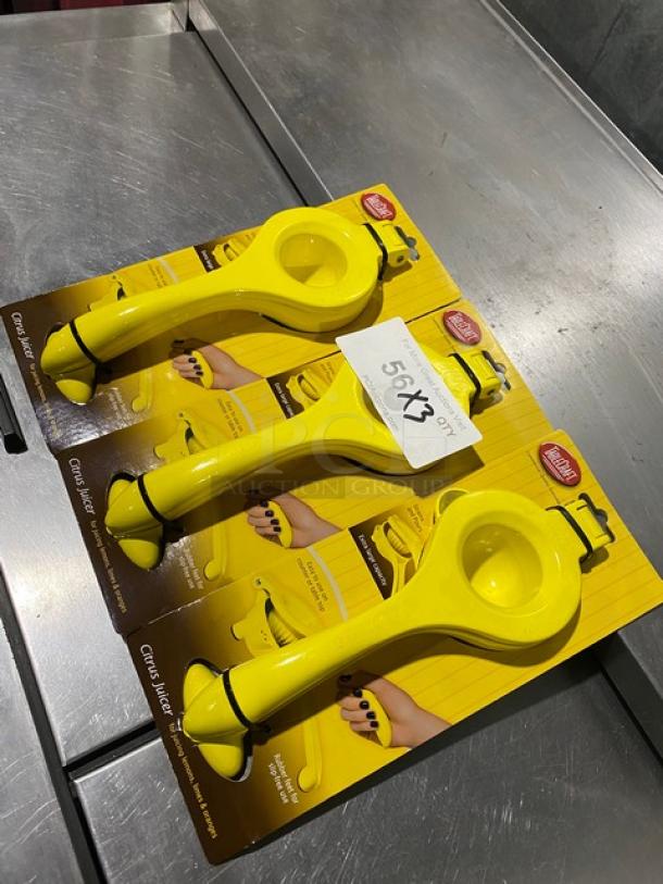 Brand new TableCraft Commercial Yellow Handheld Citrus Juicers, Model V119, set of three, in original packaging.