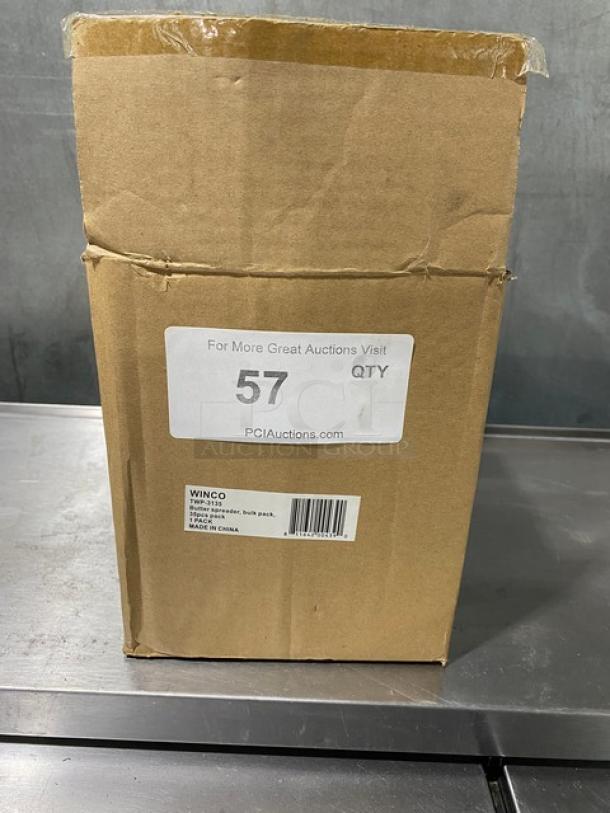 Winco stainless steel butter spreader set, model TWP-3135, new in box. Includes 35 pieces with assorted color grip handles.