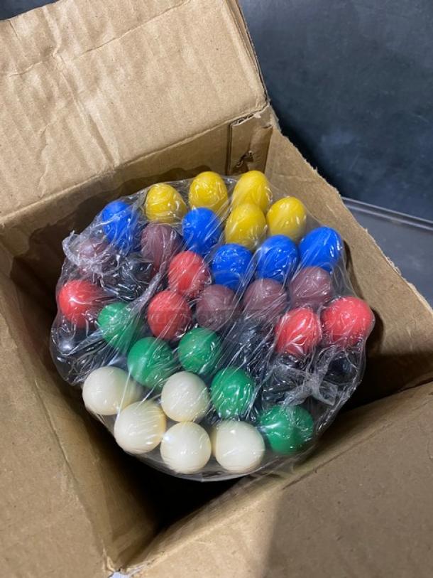 Brand new Winco TWP-3135 stainless steel butter spreaders, 35 pieces, assorted colored grip handles, packed in box.