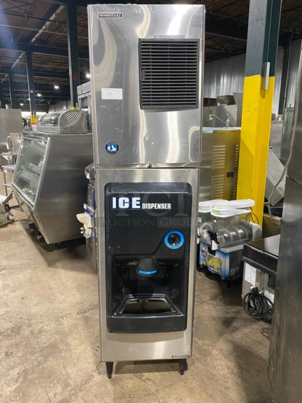 Hoshizaki stainless steel ice maker/dispenser combo, model KM-340MAH/DB-130H, push button, on legs, used condition.