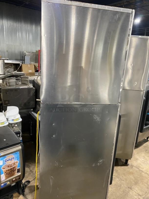 Hoshizaki KM-340MAH/DB-130H ice machine and dispenser, stainless steel, electric, push-button, on legs, commercial use.