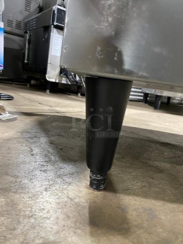Hoshizaki stainless steel ice machine leg, model KM-340MAH/DB, part of a commercial ice dispenser combo.