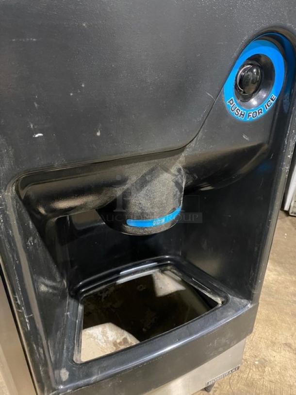 Hoshizaki commercial ice dispenser, Model KM-340MAH/DB-130H, black finish, push-button control, good condition.