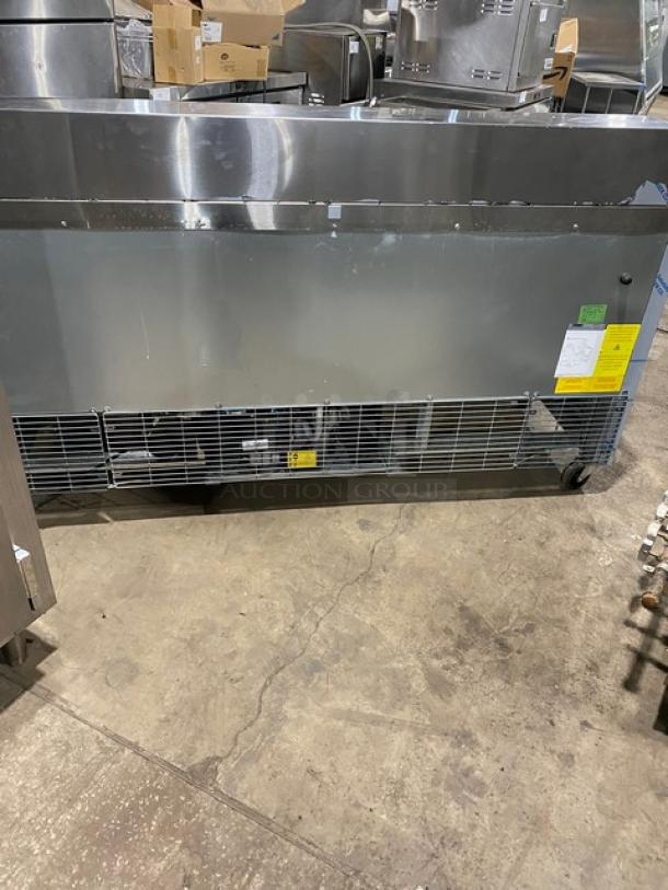Asber APTS-72-18-HC refrigerated prep table, stainless steel, 3 doors, with cutting board, on casters, model details visible.
