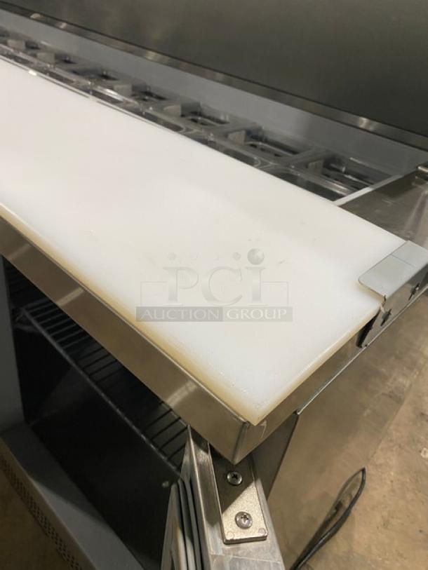 Asber APTS-72-18-HC stainless steel prep table with cutting board, polly coating wire racks, food pans, on casters, 115V, 1 phase.