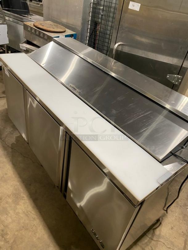 Stainless steel Asber 2021 commercial 3-door refrigerated prep table, Model APTS-72-18-HC, with cutting board and wire racks.