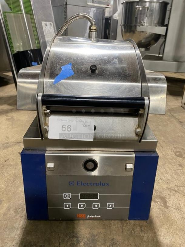 Electrolux 2015 stainless steel panini press, model HSPPA1. Electric, high-speed countertop grill. Good condition.