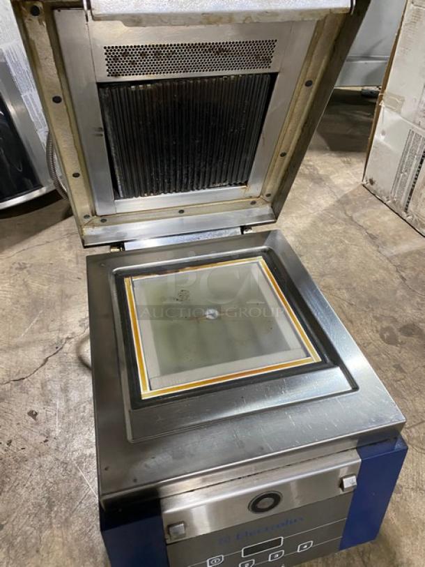 Electrolux 2015 commercial stainless steel panini press, model HSPPA1, electric, countertop, on legs, open view.