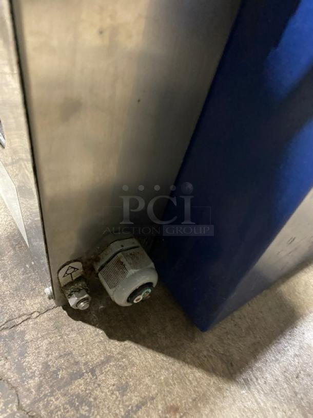 Electrolux 2015 stainless steel electric panini press, Model HSPPA1, 208V 1 Phase, on legs. Minor wear visible.