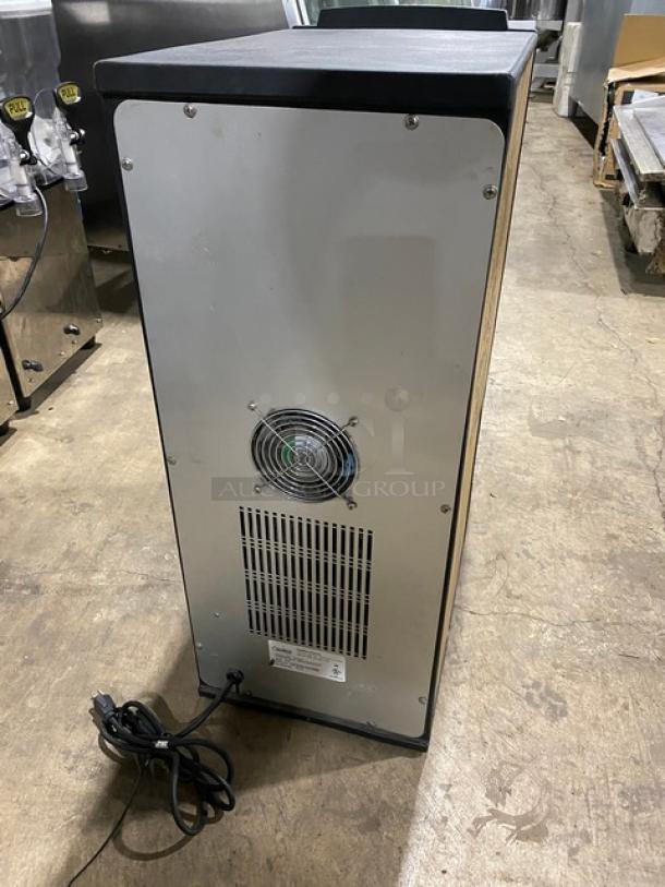 Creamiser Model 230 electric cold brew dispenser, SN: CP230-02398, with drip tray and power cord, 110V, good condition.