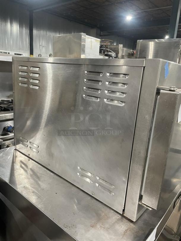 Cleveland 21CET8 stainless steel 3-pan convection steamer, electric, countertop model with built-in rack, 208V 3 phase.