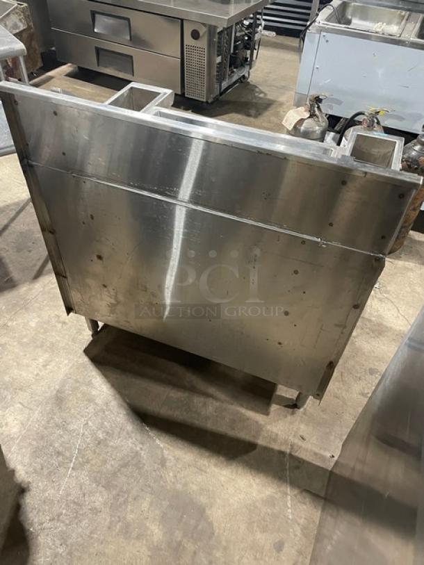 Infinity ICS-36-P10-CB-M stainless steel underbar ice bin and cocktail station with double speed rail on legs.