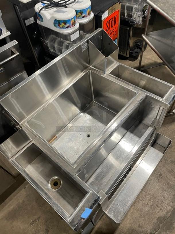 Infinity stainless steel underbar ice bin/cocktail station, model ICS-36-P10-CB-M, with double speed rail and legs.