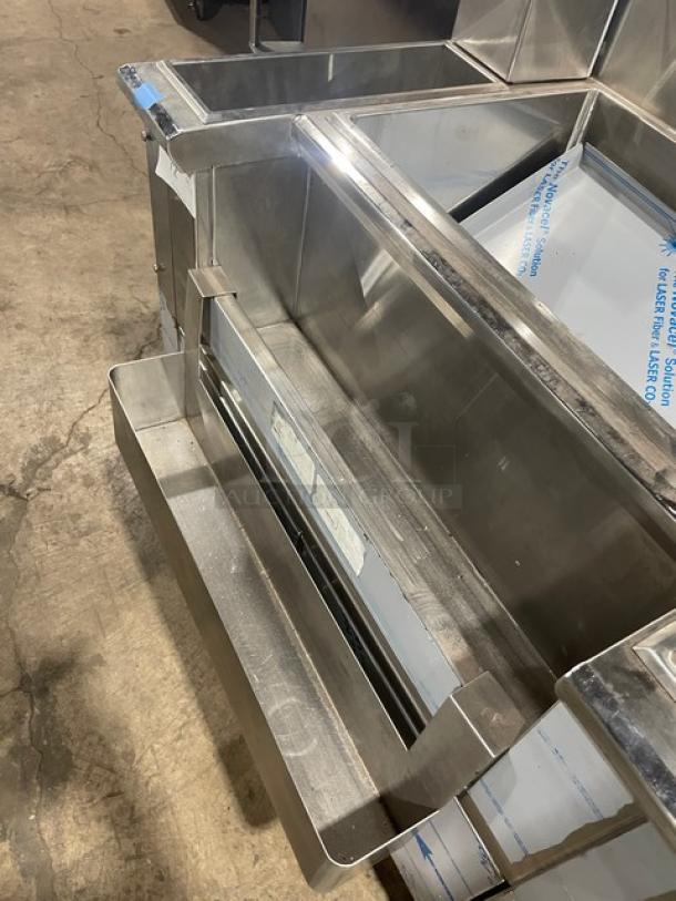 Infinity commercial stainless steel underbar ice bin, Model ICS-36-P10-CB-M, with double speed rail and legs, pristine condition.