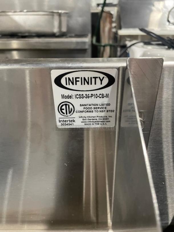 Infinity ICS-36-P10-CB-M stainless steel underbar ice bin with double speed rail, on legs. ETL and NSF certified.