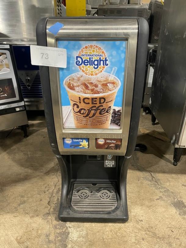 Creamiser Model 220 black electric countertop iced coffee dispenser. Features dual flavor options, drip tray, 110V.