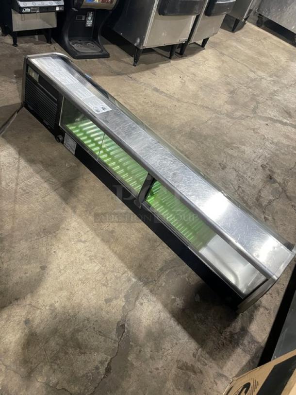Hoshizaki stainless steel refrigerated sushi display, model HNC-150BA-R-S, with rear sliding doors, 115V, excellent condition.