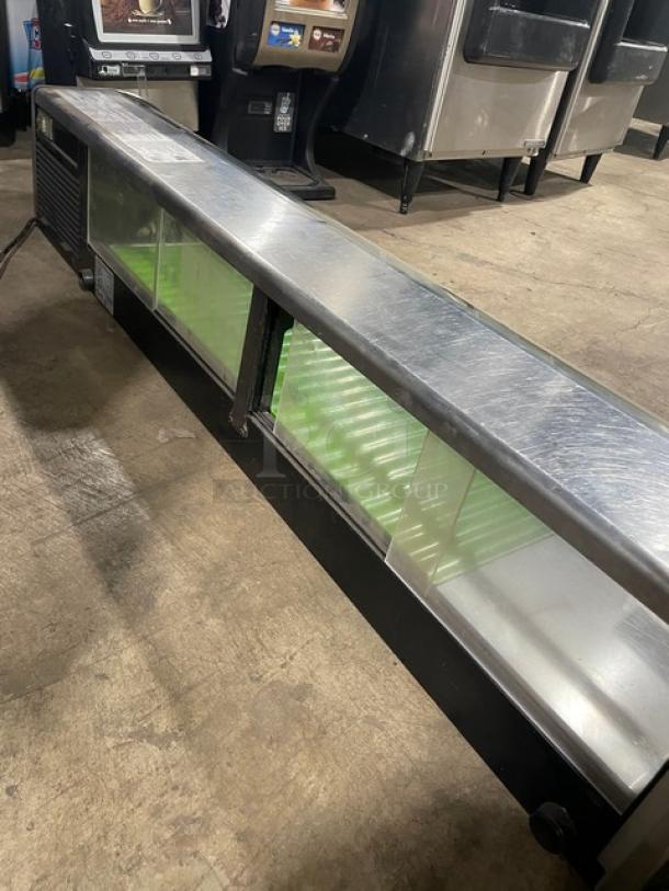 Hoshizaki HNC-150BA-R-S stainless steel refrigerated sushi merchandiser, electric-powered, rear access sliding doors, used condition.
