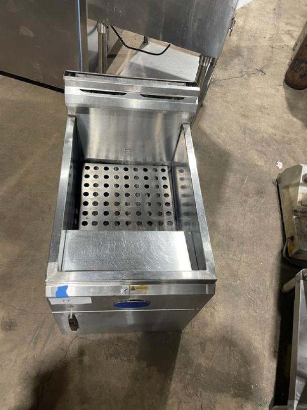 Globe stainless steel natural gas countertop deep fat fryer with backsplash and basket hanger, good condition.