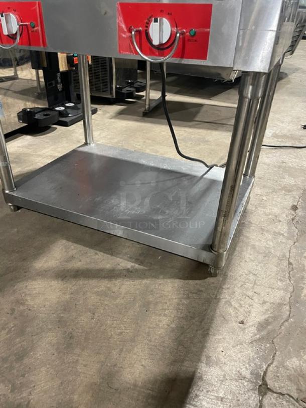 Omcan FZ-06B1 2019 commercial stainless steel 2-bay hot food table, electric-powered, with single undershelf and legs.