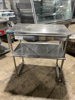 Sapphire commercial stainless steel double overhead shelf with order/receipt holder, durable, and in good condition.