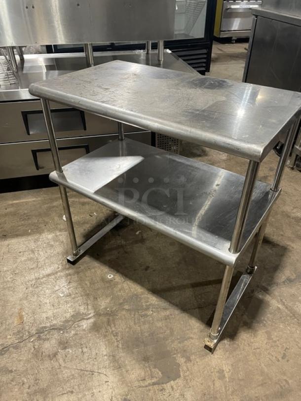 Sapphire stainless steel double overhead shelf with order/receipt holder. Commercial-grade, used condition, durable design.