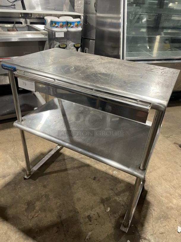 Sapphire stainless steel double overhead shelf with order/receipt holder, commercial-grade, sturdy condition.