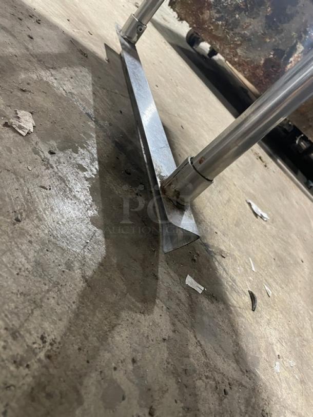Sapphire stainless steel double overhead shelf leg, commercial grade, with visible order/receipt holder attachment.