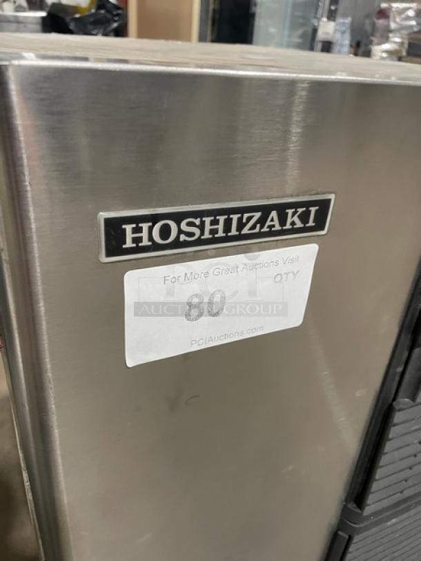 Hoshizaki KM-320MAH commercial stainless steel ice machine head, model and serial number visible. Electric, 115V, 1 phase.