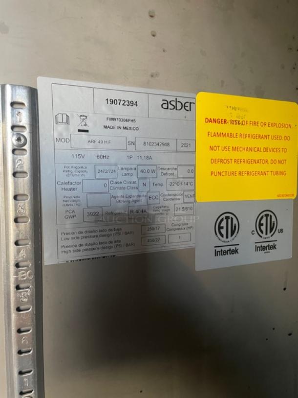 Asber ARF49 commercial stainless steel 2-door reach-in freezer, 2021 model, 115V, on casters. Serial: 81002342948.