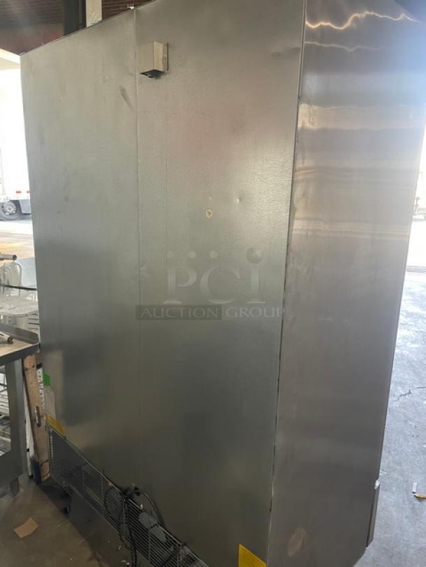 Asber ARF49 commercial stainless steel 2-door reach-in freezer, 2021 model, on casters, 115V, 1 phase.