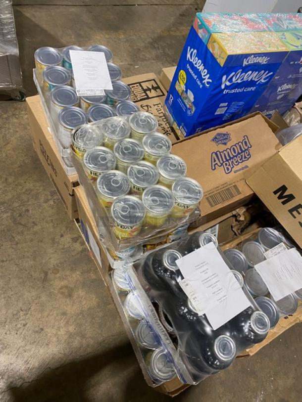 Brand new mixed pallet with Kleenex 2-Ply tissues, 12-box cases, assorted snacks, and beverages. Includes Almond Breeze packs.